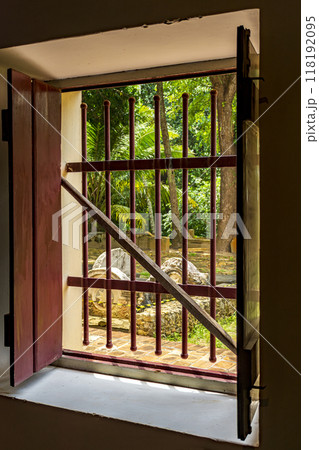 Open window of old colonial house Open window of old colonial house 118192095
