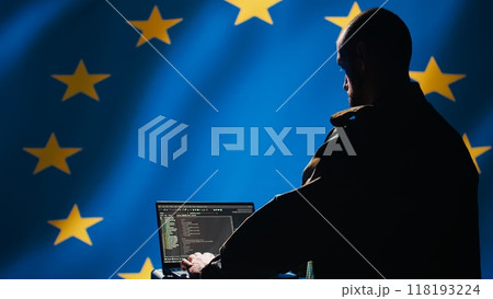 EU alliance engineer protecting against fake accounts on social media promoting totalitarian governments interests. Technician working for European Union doing cybersecurity job, camera B EU alliance engineer protecting against fake accounts on social media promoting totalitarian governments interests. Technician working for European Union doing cybersecurity job, camera B 118193224