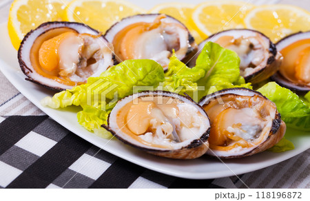 Raw bivalve shellfishes with lemon 118196872