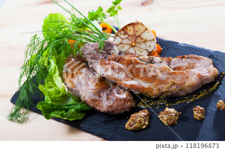 Tasty juicy roasted pork chop 118196873