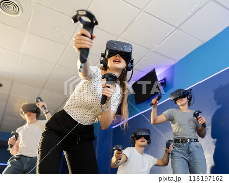 girl in vr helmet act and escape flying asteroids during space adventure game.bottom view 118197162