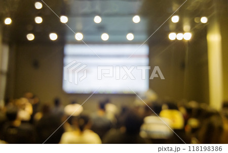 Blurred background people join seminar business event in auditorium hall convention. Presentation meeting at conference room present screen business. Blurred background with copy space Blurred background people join seminar business event in auditorium hall convention. Presentation meeting at conference room present screen business. Blurred background with copy space 118198386