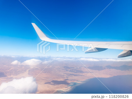View from the airplane window of the mountains and sea resort with corals in Egypt, Sharm El Sheikh.Flight 118200826
