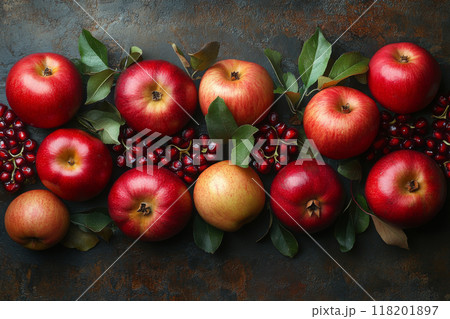 Apples and pomegranate seeds on a dark background. Traditional Jewish cuisine for the New Year holiday - Rosh Hashanah 118201897