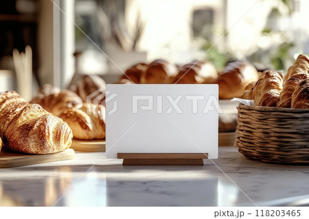 A white card is placed on top of a background with several croissants with Generative AI 118203465