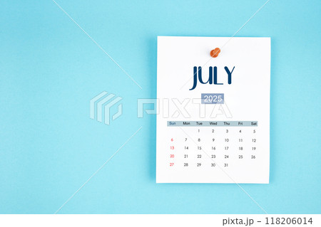July 2025 calendar page with push pin on blue background. July 2025 calendar page with push pin on blue background. 118206014