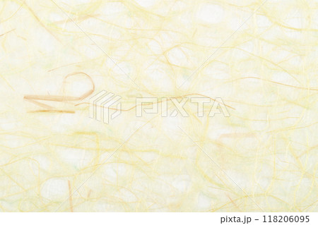 Abstract yellow Japanese paper texture for the background. Mulberry paper craft beige color. Abstract yellow Japanese paper texture for the background. Mulberry paper craft beige color. 118206095