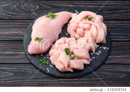 Raw chicken meat fillet ( breast ) Various of cutting in form slice and cube 118209142