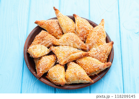Homemade triangle puff pastry with meat on rustic background . Samosa 118209145