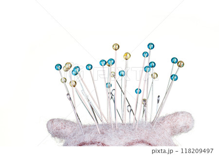 pincushion in the form of an owl on a white background 118209497
