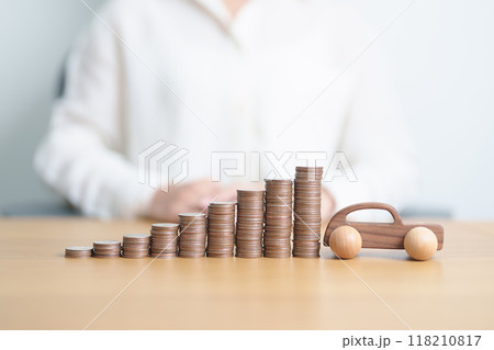 Money Saving, Car Insurance, Financial, vehicle Repair and Maintenance concepts. coins stack and piggy bank with Auto model, Money stack Counting arrangement for deposit and Automobile Tax Money Saving, Car Insurance, Financial, vehicle Repair and Maintenance concepts. coins stack and piggy bank with Auto model, Money stack Counting arrangement for deposit and Automobile Tax 118210817
