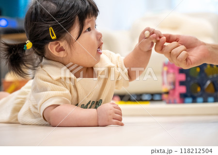 portrait of a baby girl 118212504