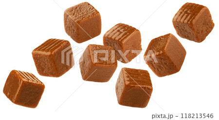 Flying caramel candies, toffee bonbons isolated on white background with clipping path 118213546