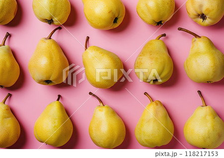 Colorful pattern of yellow pears on pastel pink color background. Ripe juicy whole pears. Autumn, fall, harvest festival. Minimal trendy repeated fruits. Soft shadow. Top view, flat lay. Natural food 118217153