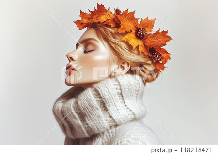 秋の紅葉を冠に纏い、自然の美しさを表現する女性 秋の紅葉を冠に纏い、自然の美しさを表現する女性 118218471