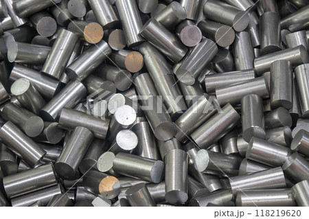 The pile of raw material metal rod ingot. The pile of raw material metal rod ingot. 118219620