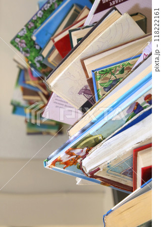 A stack of old children's books and textbooks. A stack of old children's books and textbooks. 118222161