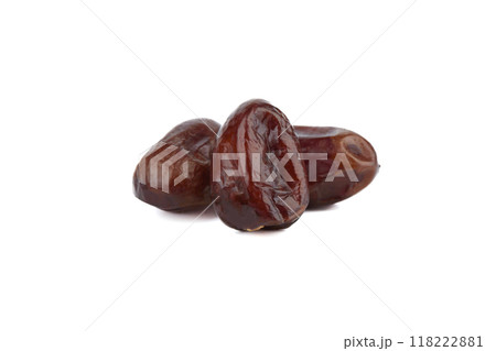 Three dehydrated date fruits isolated on white background. 118222881