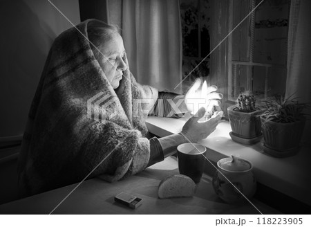 Woman with candles. Power outage in Kyiv Woman with candles. Power outage in Kyiv 118223905
