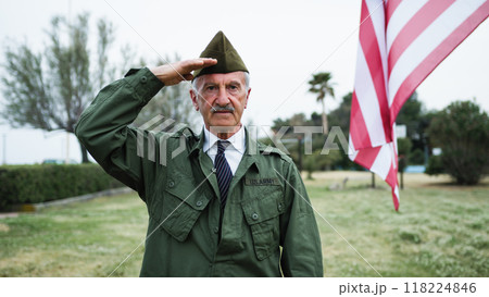 Sad Elderly Veteran Remembers Fallen In Second War at Memorial Day Cemetery Sad Elderly Veteran Remembers Fallen In Second War at Memorial Day Cemetery 118224846