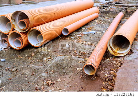 In preparation for installation, HDPE polyethylene sewer pipes are ready to form backbone of new infrastructure project In preparation for installation, HDPE polyethylene sewer pipes are ready to form backbone of new infrastructure project 118225165