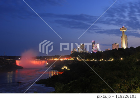 Aerial view of Horseshoe Falls illuminated on dusk and Niagara River, Canada and USA natural border 118226103
