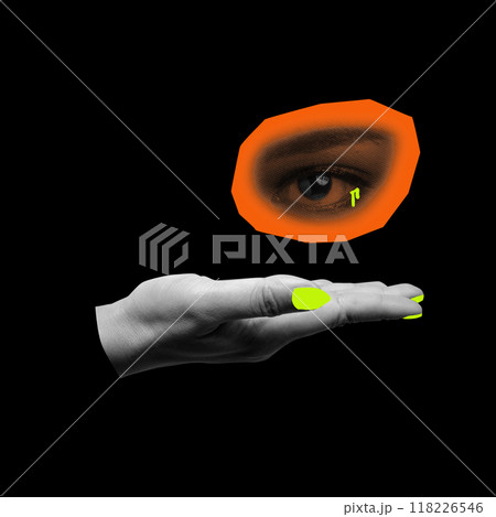 A hand showing an orange circle with a black background A hand showing an orange circle with a black background 118226546