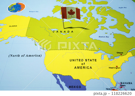 A map of Canada with a Canadian flag on it A map of Canada with a Canadian flag on it 118226620