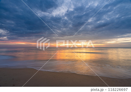 Beautiful sunset at famous Natai beach in Phang nga, southern part of thailand close to Phuket. 118226697