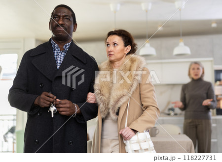 Husband and wife leave home, leaving mature mother alone at home Husband and wife leave home, leaving mature mother alone at home 118227731