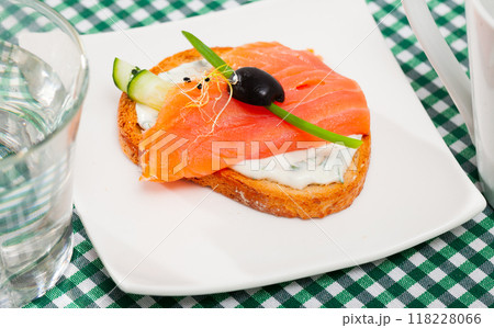 Sandwich with salmon, cucumber, sauce Sandwich with salmon, cucumber, sauce 118228066