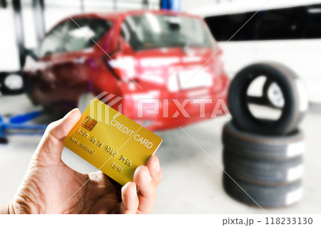 Concept of paying for tires or maintenance by credit card Concept of paying for tires or maintenance by credit card 118233130