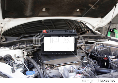 Car battery with blank white sign , battery placed on engine compartment for car electronic system Car battery with blank white sign , battery placed on engine compartment for car electronic system 118233135