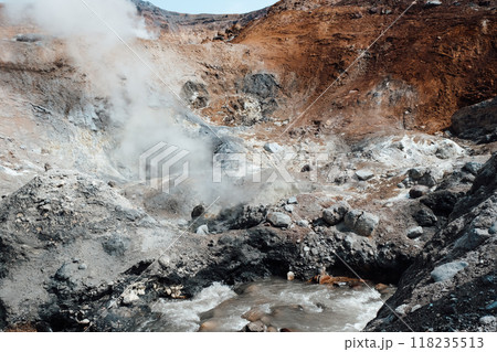 View of mountains and volcanoes from the edge of the crater View of mountains and volcanoes from the edge of the crater 118235513