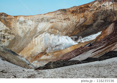 View of mountains and volcanoes from the edge of the crater 118235536