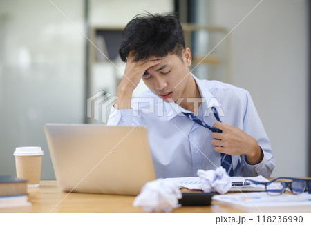 Stressed Businessman or Office Worker Facing Overwork and Pressure 118236990