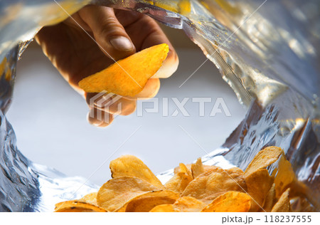 Potato chips. View from inside the package 118237555
