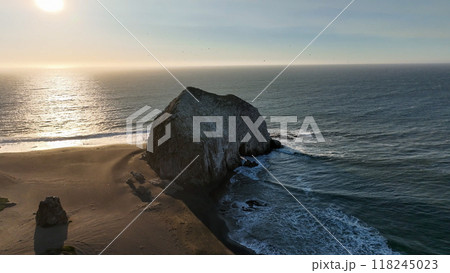 Large rocks natural monument Piedra de Iglecias Church stone on Chilean coast in Constitucion in sunset. Large rocks natural monument Piedra de Iglecias Church stone on Chilean coast in Constitucion in sunset. 118245023