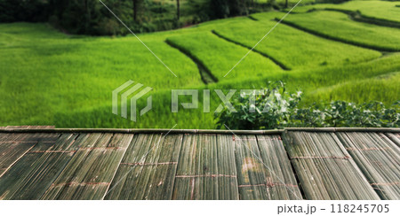 Bamboo table and natural green rice field view ,background image 118245705