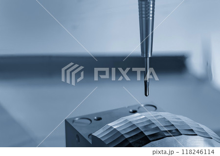 The CNC milling machine cutting mold part by solid ball end mill tool. The CNC milling machine cutting mold part by solid ball end mill tool. 118246114