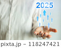 A person is holding a hand up with a blue and white background 2025 concept 118247421