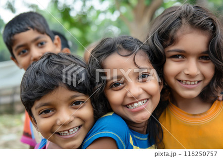 Joyful indian children playing outdoors 118250757