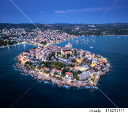 Aeriel view of old town with street lights on island at night 118251523