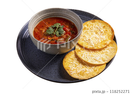 Nacho chips in black bowl with Mexican soup isolated on white background. 118252271