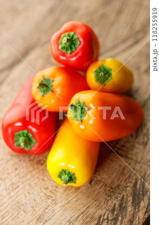 Colorful Sweet Pepper Chili, Baby Small Bell Pepper on wooden background 118255919