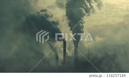 A large industrial plant is emitting smoke into the air A large industrial plant is emitting smoke into the air 118257184