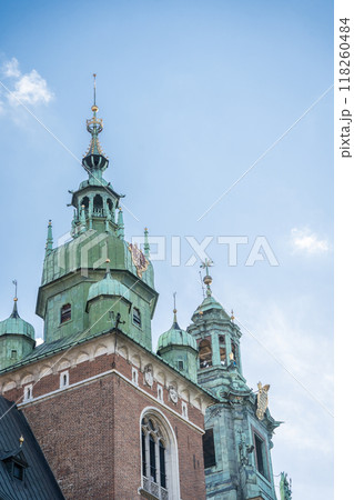 Detailed vertical shot of beautiful medieval castle towers, Krakow, Poland Detailed vertical shot of beautiful medieval castle towers, Krakow, Poland 118260484