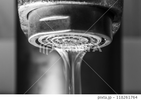 A stream of water from the tap 118261764