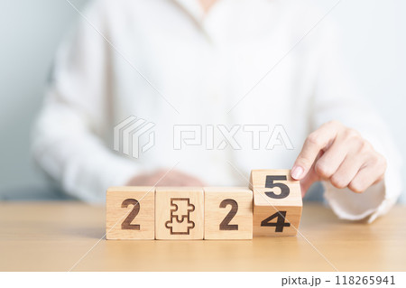 2024 year change to 2025 year block with jigsaw puzzle icon. Business Process, Team, teamwork, Goal, mission, Resolution, strategy, plan, Action, partnership, and New Year start 118265941