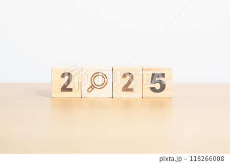 2025 block with magnifying glass icon. SEO, Search Engine Optimization, hiring , Advertising, Idea, Strategy, marketing, Keyword, Content and New Year start concepts 118266008